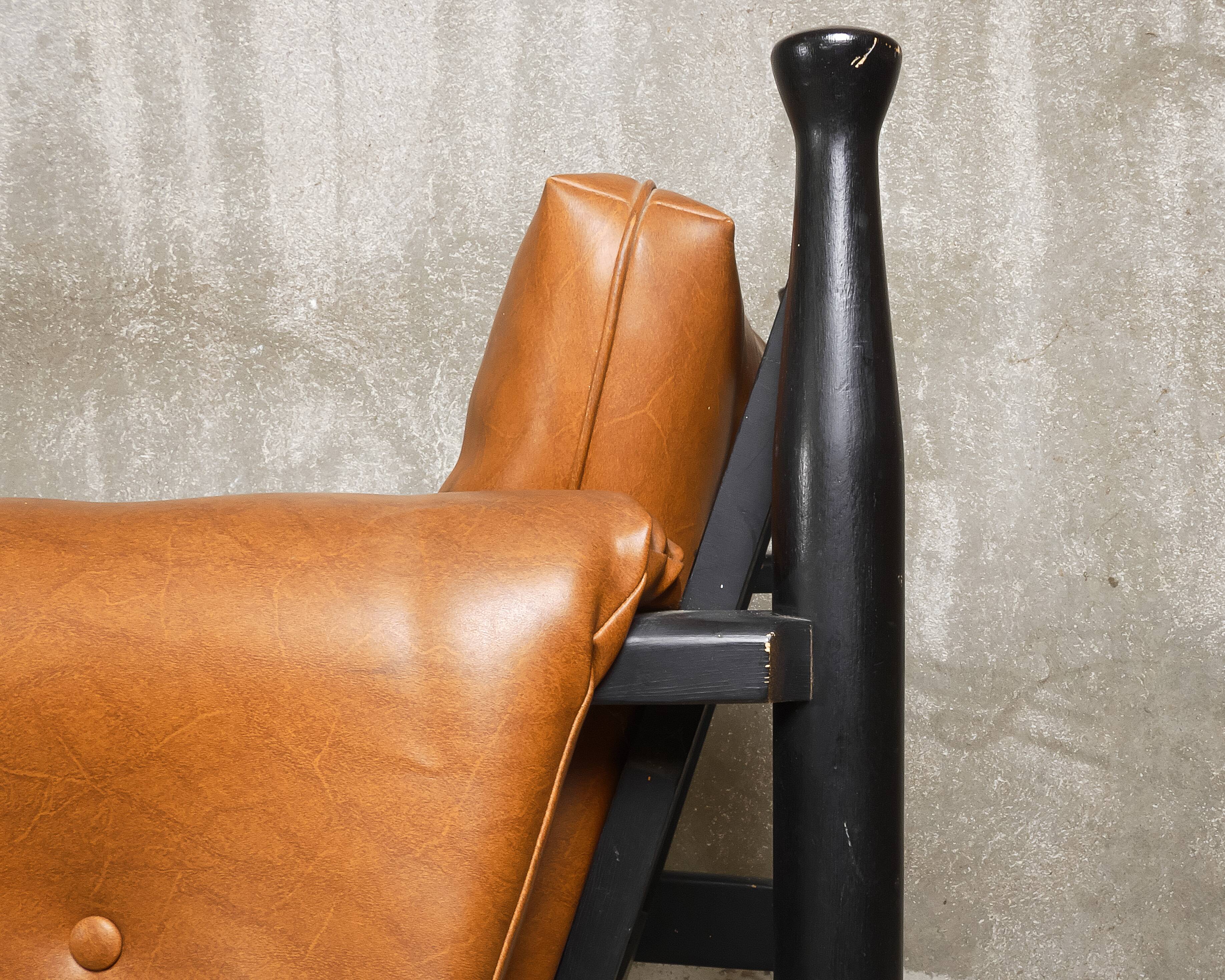 c. 1970 - Pair of lounge chairs in lacquered beech and cognac leather - France
