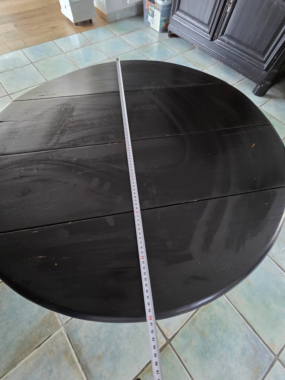 Oval gateleg table from the late 19th century, repainted in black.