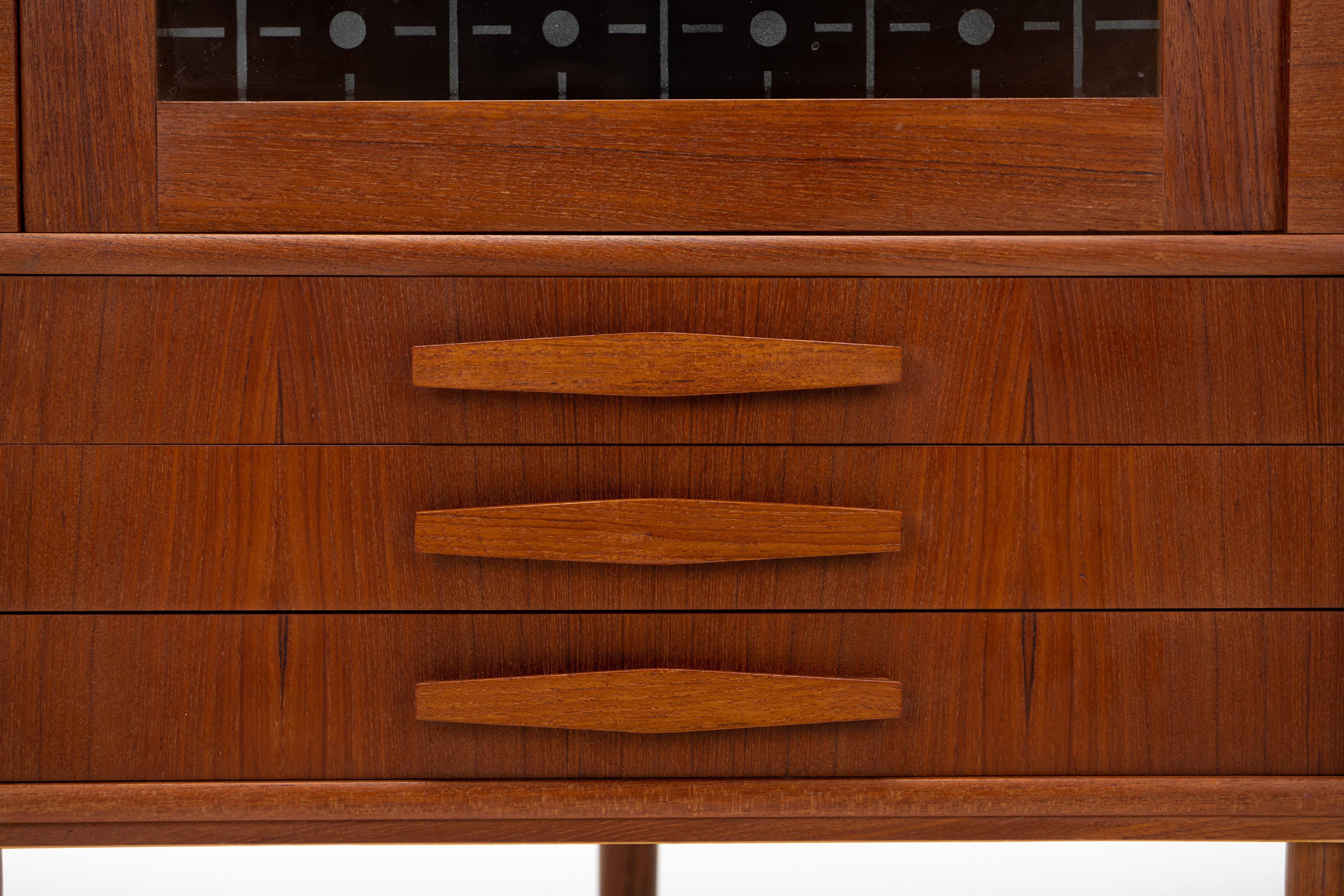 Danish vintage corner cabinet in teak and glass