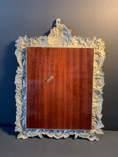 Antique Italian mirror in repoussé silver metal