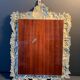 Antique Italian mirror in repoussé silver metal