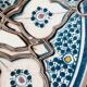 Vintage Moroccan plate in ceramic with filigree of alpaca and bone.