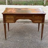 Louis XVI desk in solid wood and leather from the 20th century.