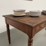 Walnut and pine drapery farmhouse table