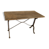 Table de bistrot ancienne avec pieds en fonte et plateau en bois