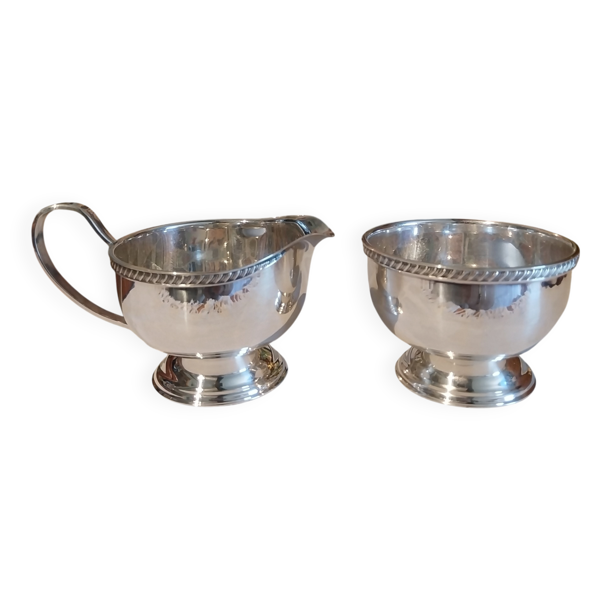 Vintage silver-plated sugar bowl and cream jug by Viners of Sheffield.