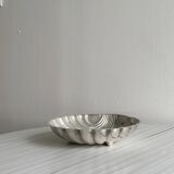Large metal shell dish