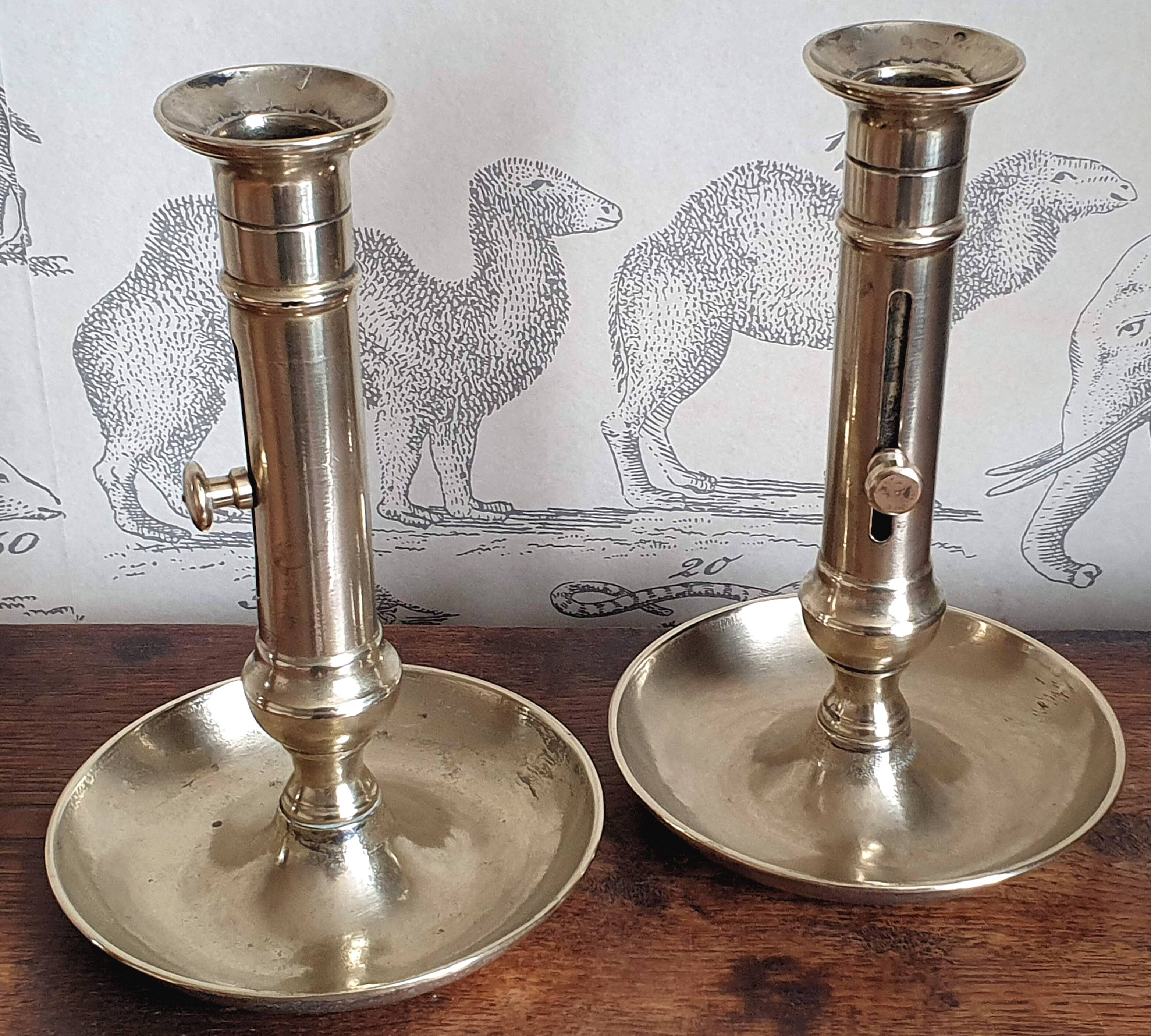 Duo of old brass candle holders