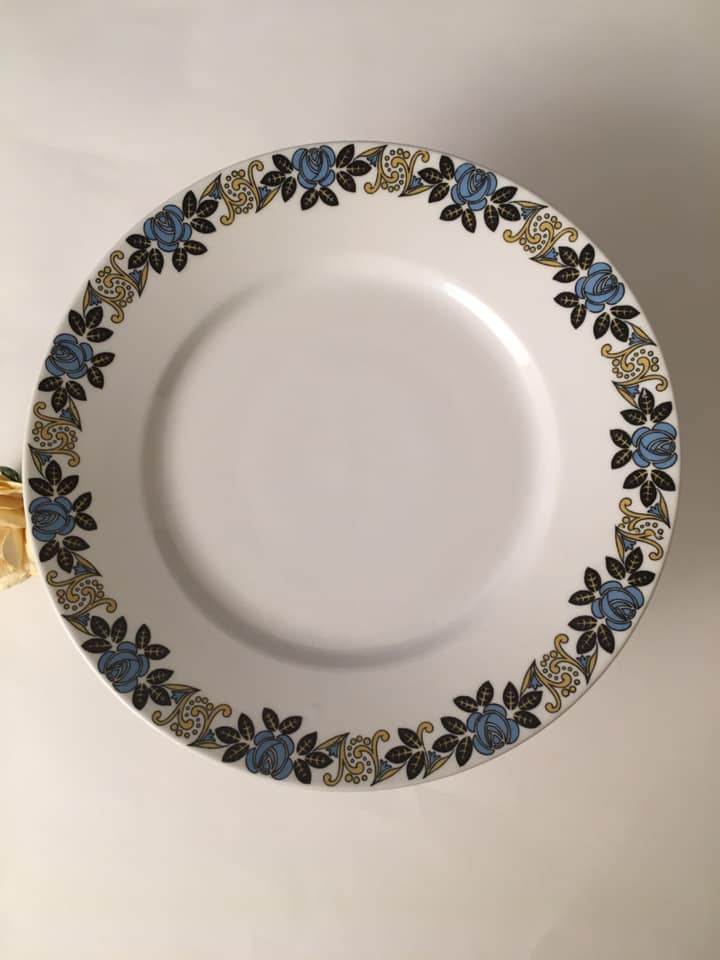 Limoges porcelain cake display with stylized floral motifs