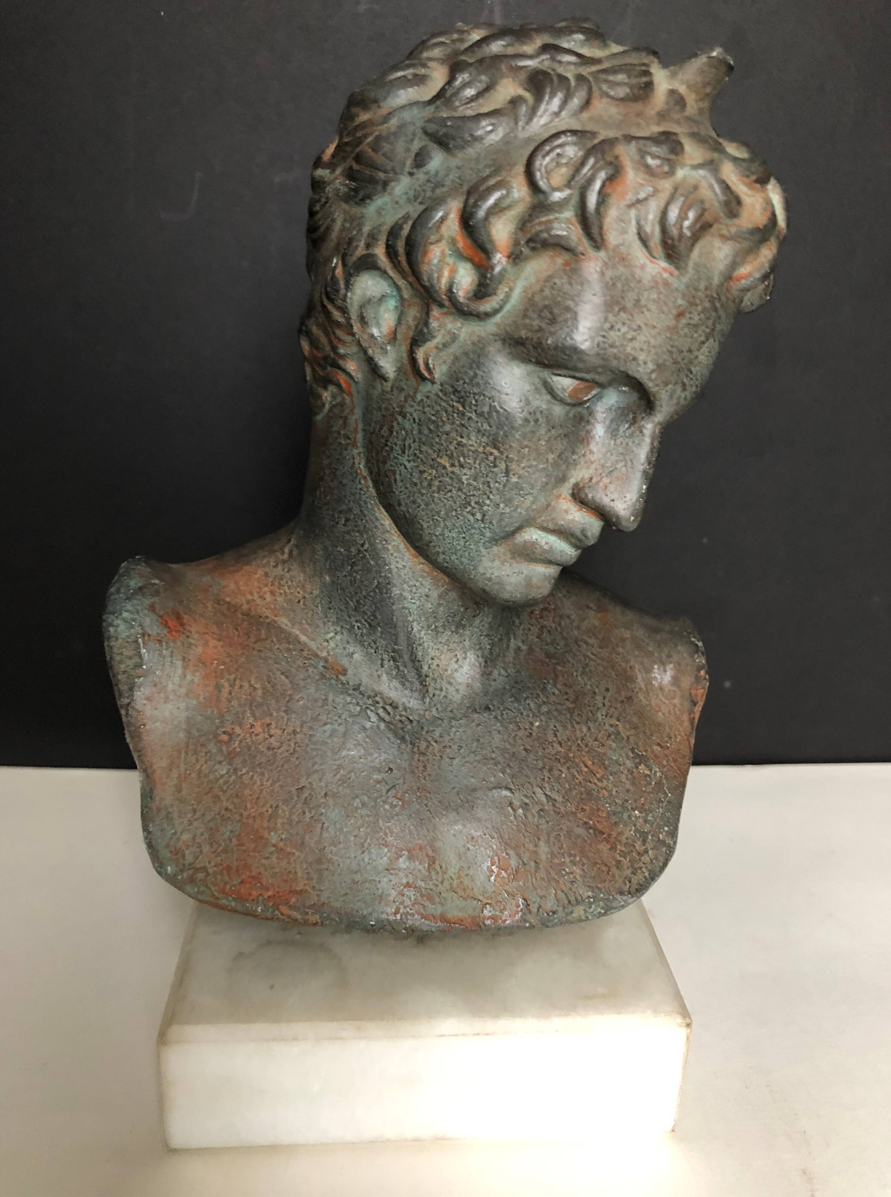 Greek bust in terracotta with bronze patina
