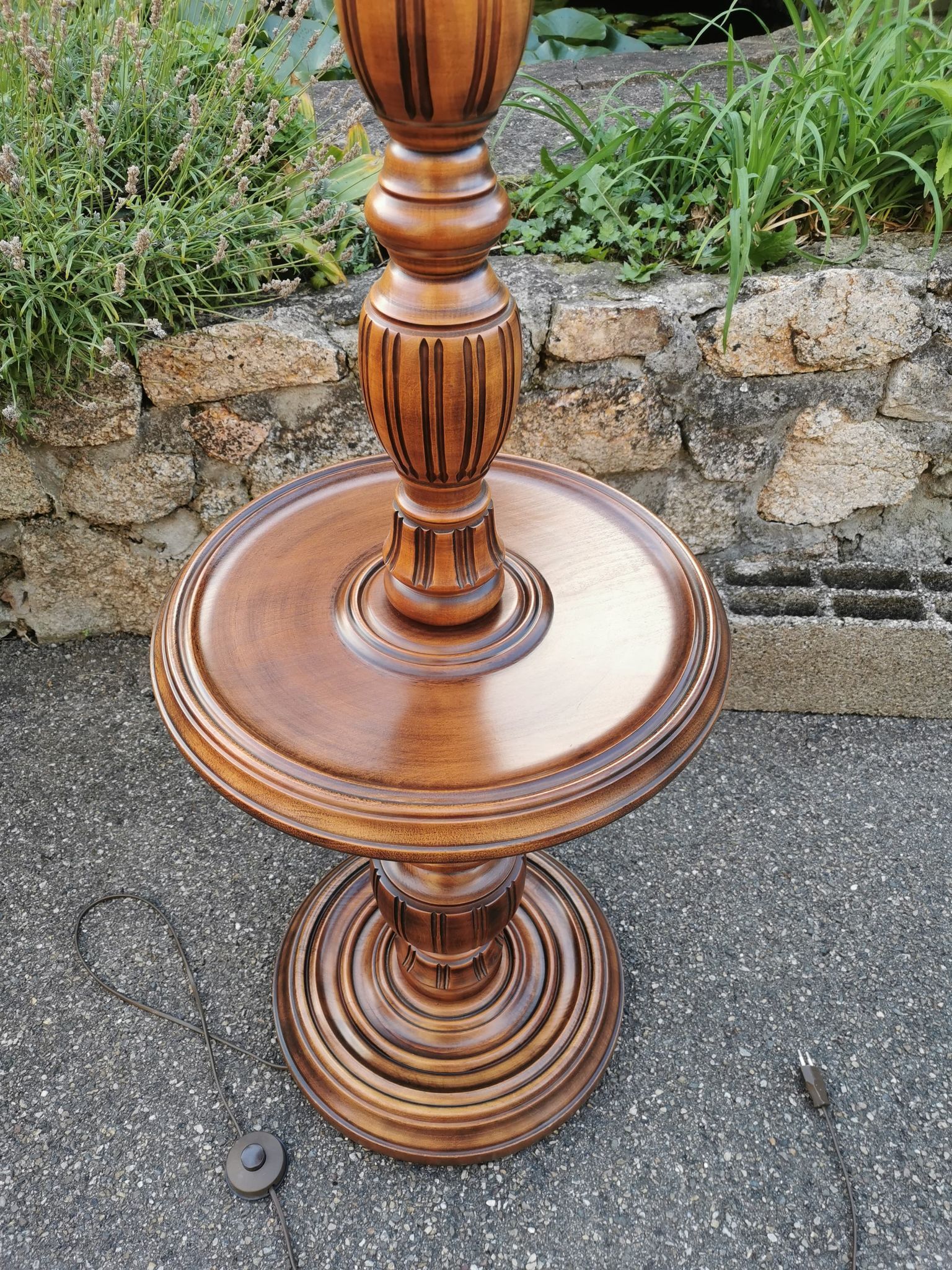 Turned wooden floor lamp with lampshade