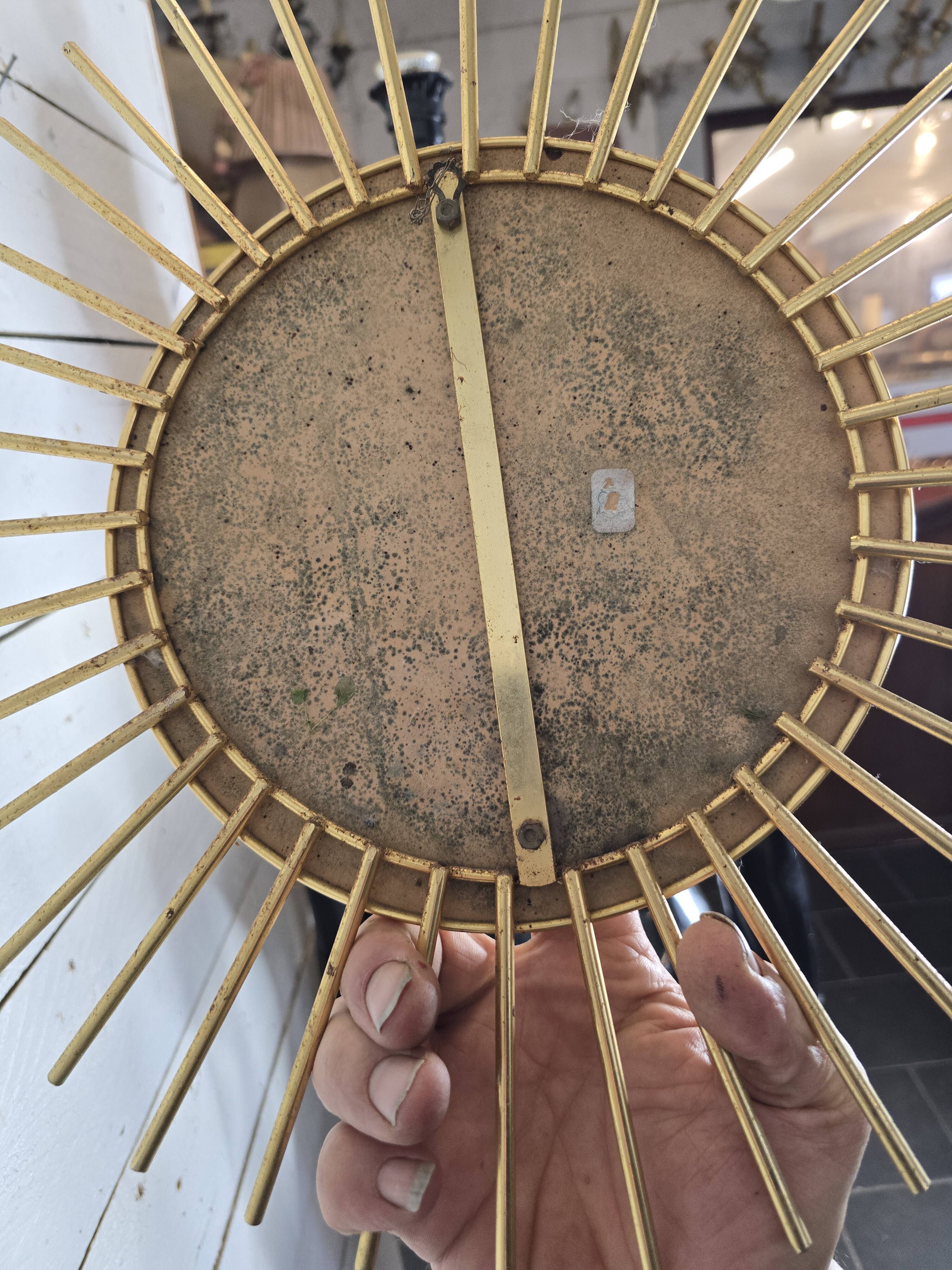 Gold metal sun mirror from the 60s