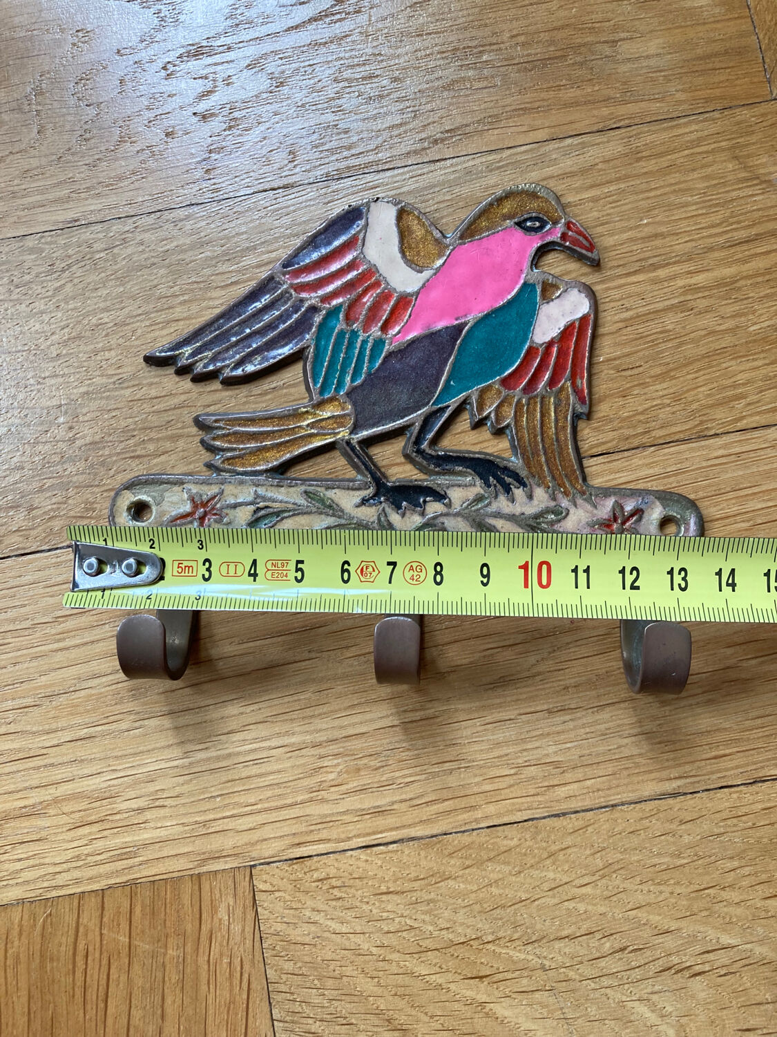 Hanging cloth bird brass