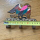 Hanging cloth bird brass