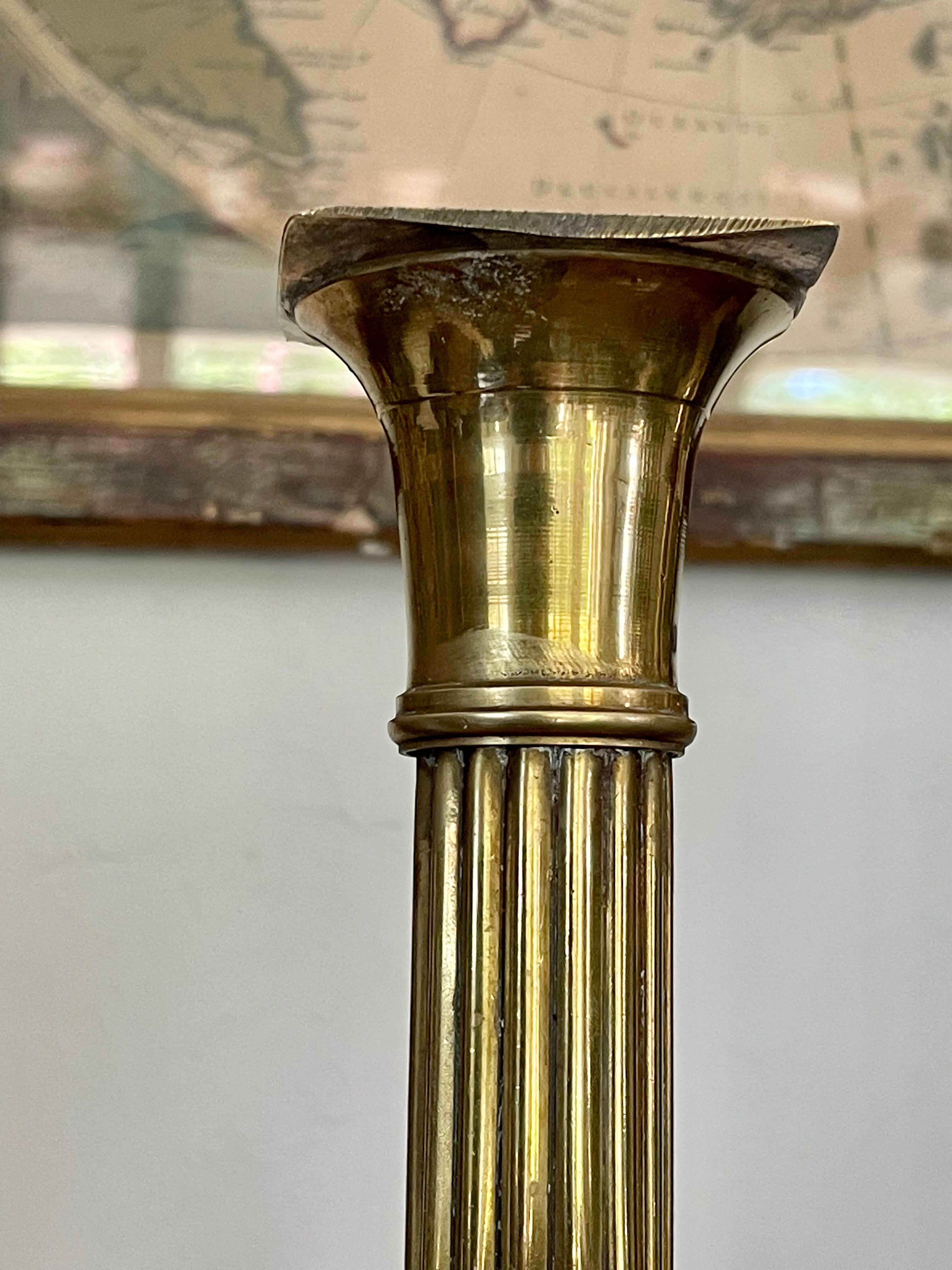 Payroll of brass column candle holders