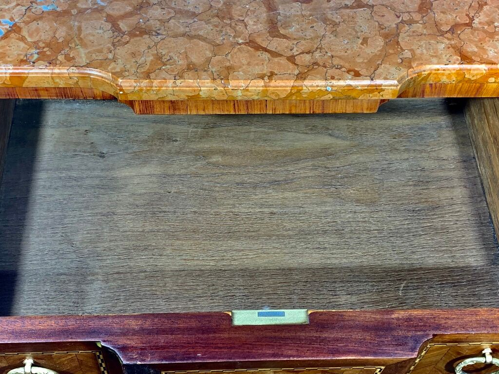 Transition style chest of drawers in rosewood and violet wood, ebony and gilded bronzes