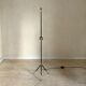 Lampadaire tripode vintage metal noir et boule laiton