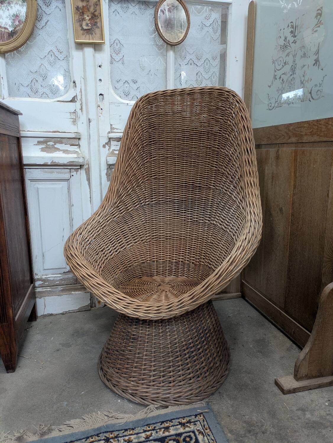 Large woven rattan armchair