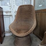 Large woven rattan armchair