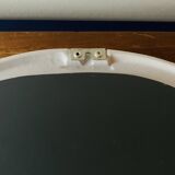 Oval mirror in vintage enameled white cast iron