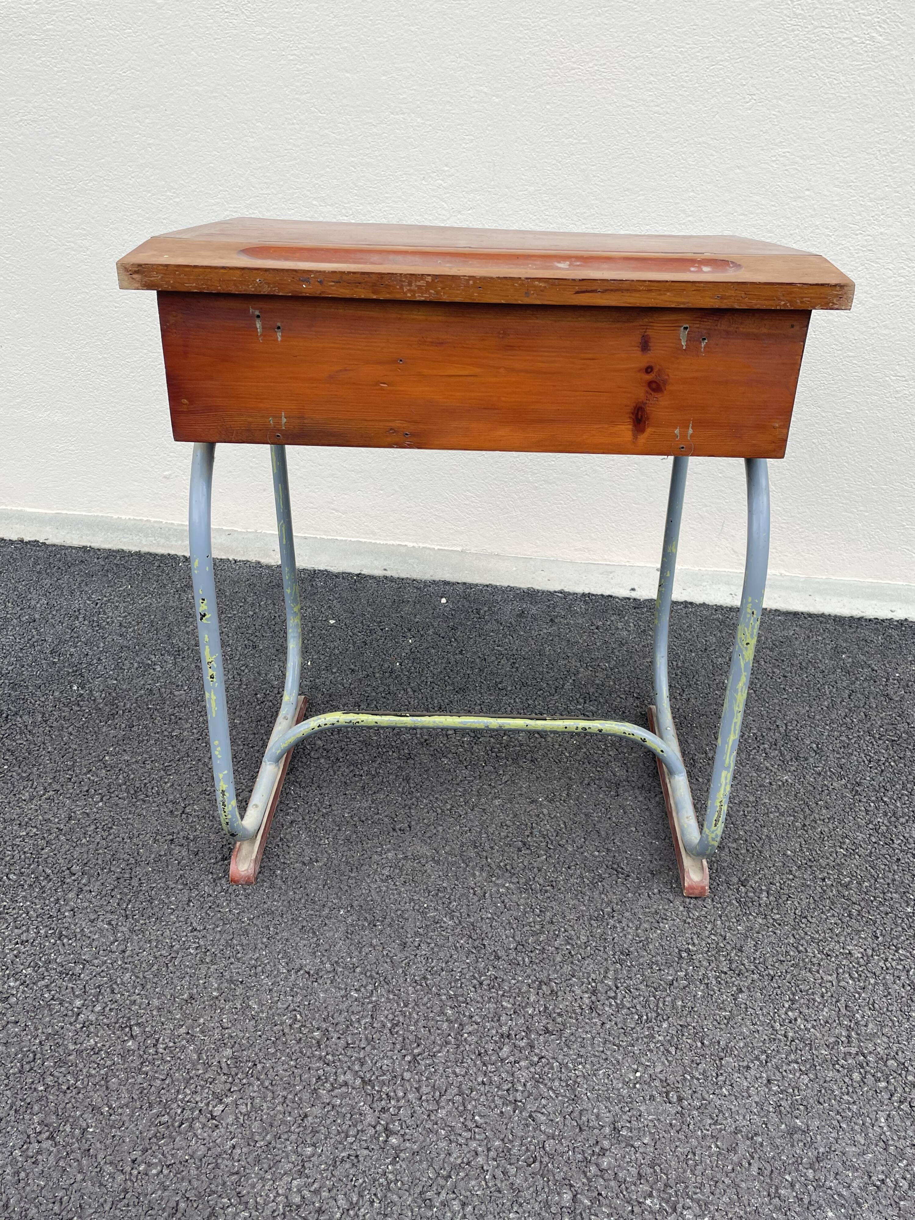 Small designer children's desk and its vintage chair
