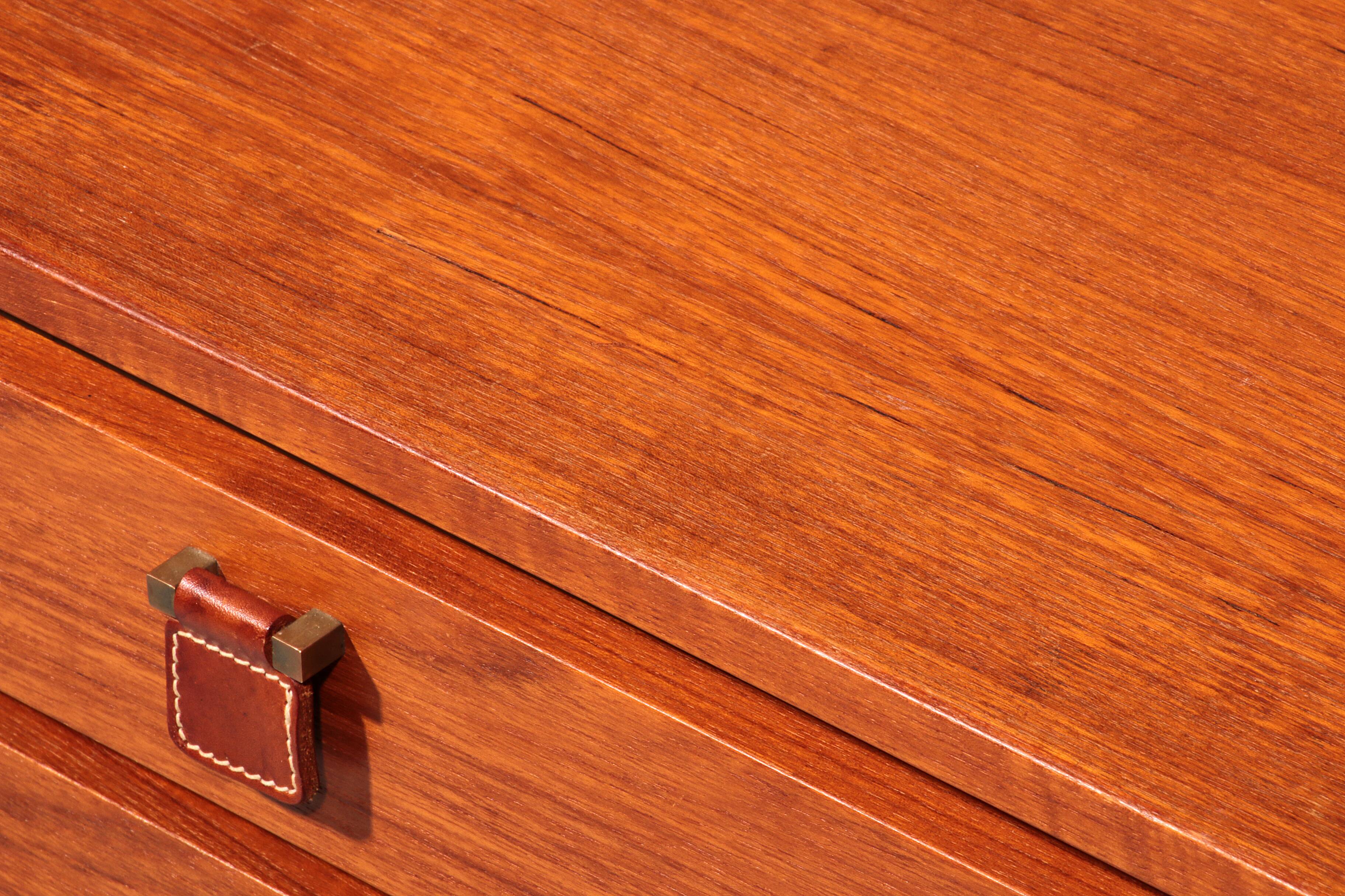Vintage teak chest of drawers with leather handles by Fröseke Nybrofabrik