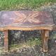 Bench in carved and varnished wood, mountain chalet decoration, old