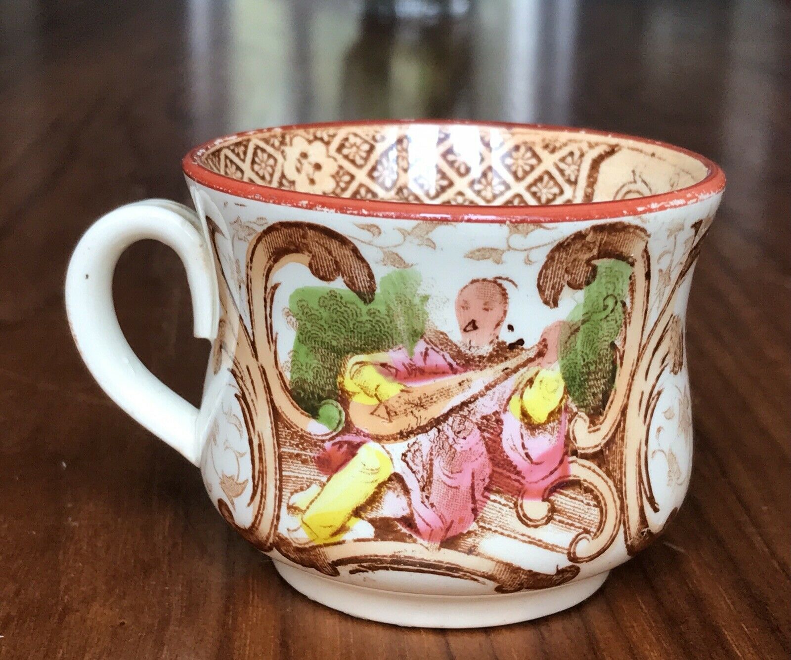 Cup Digoin Sarreguemines xix è décor to chinese guitar player