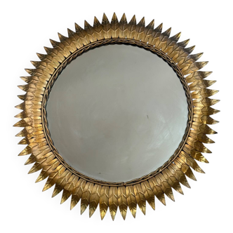 Round sun mirror in wrought iron from the 1950s Italy.