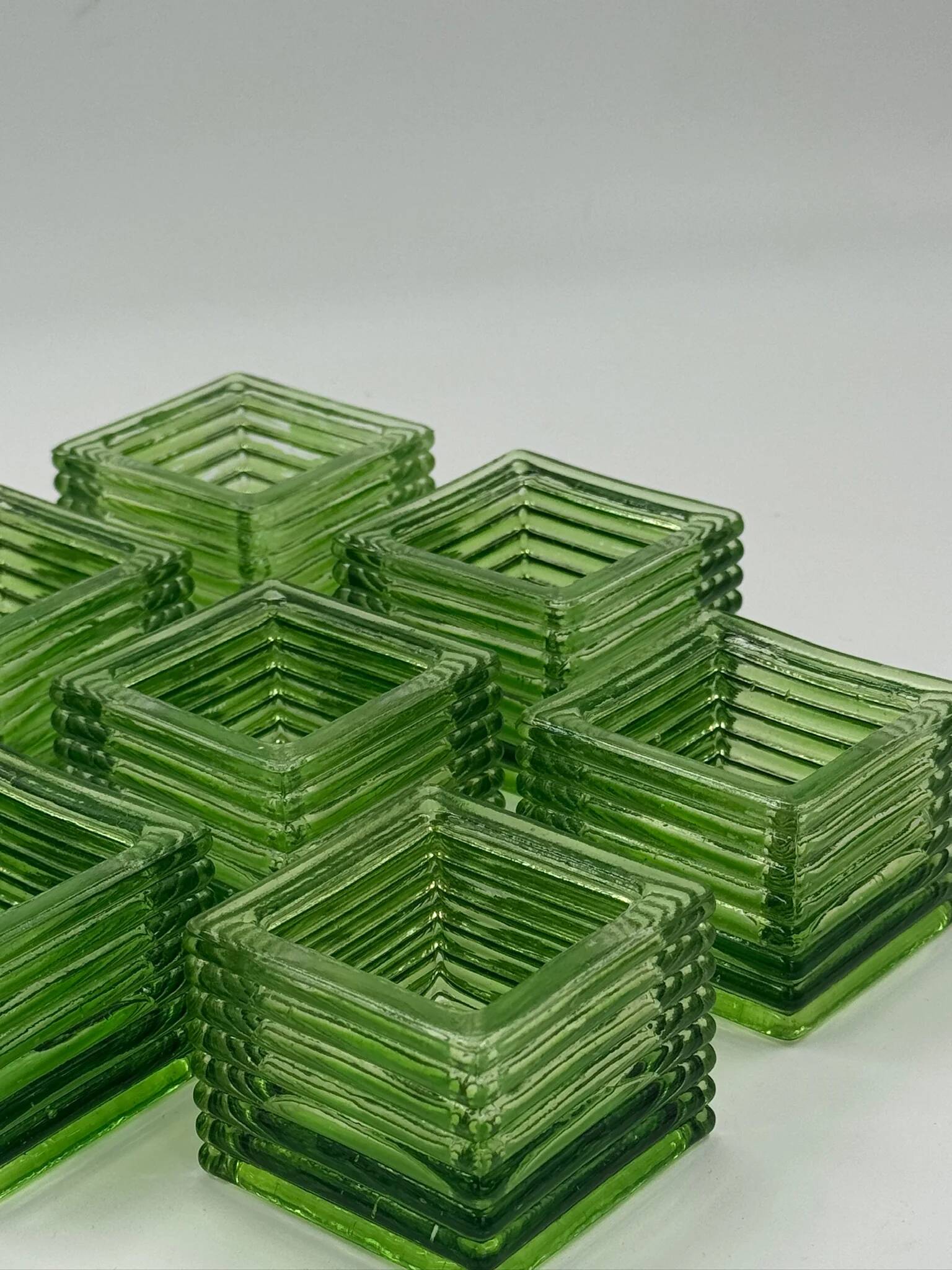 Set of 8 vintage green pressed glass candle holders