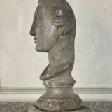 Female bust sculpted in stone
