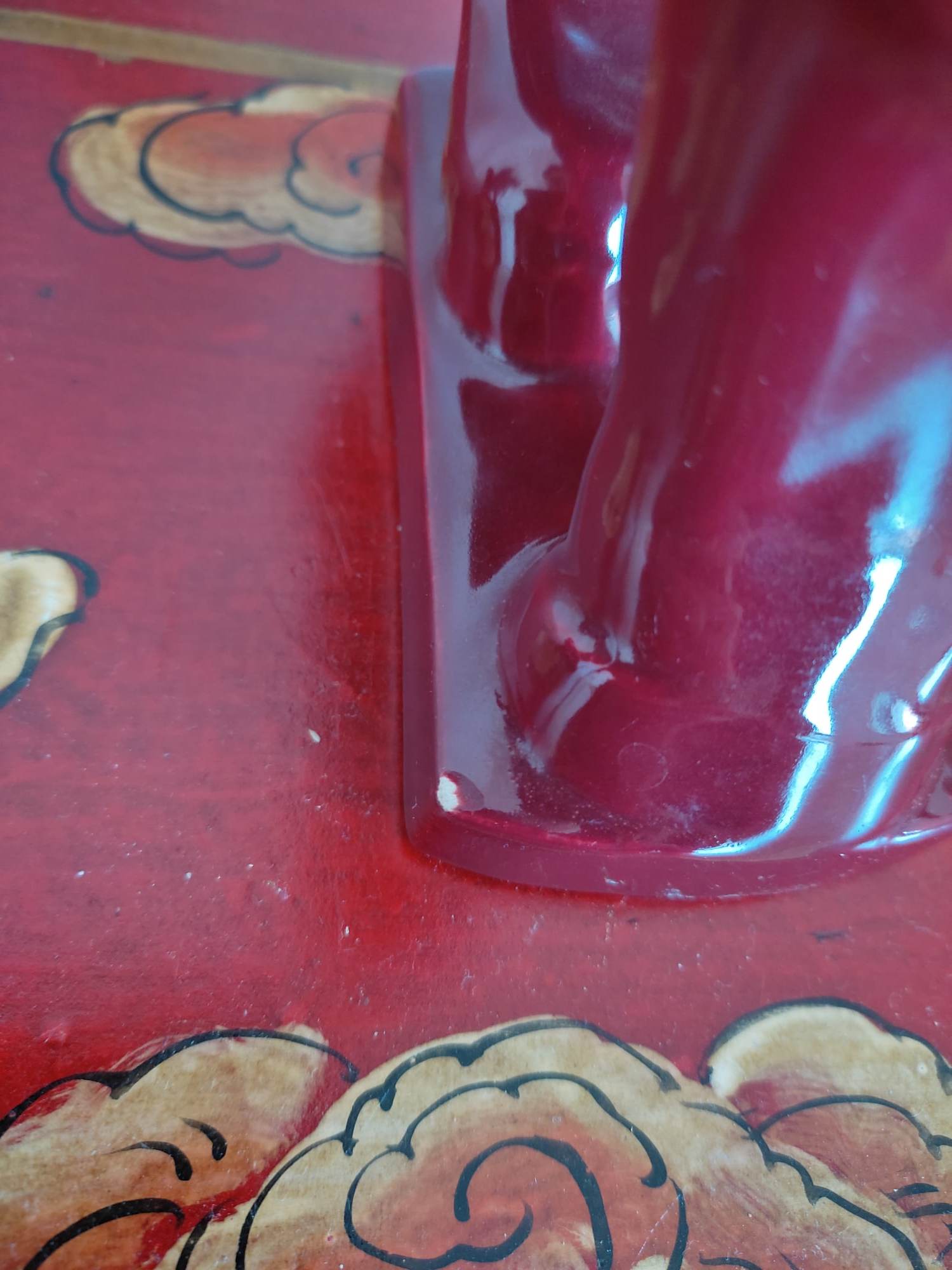 Pair of red porcelain horse bookends