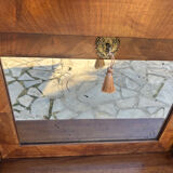 A small piece of Bonheur du jour with detached columns in Empire-era mahogany.