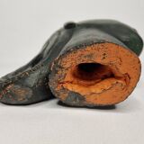Stylized female head in terracotta, modernist style, signed, 23 cm