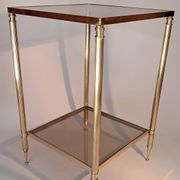 Gilded brass and smoked glass end table, 1960s.