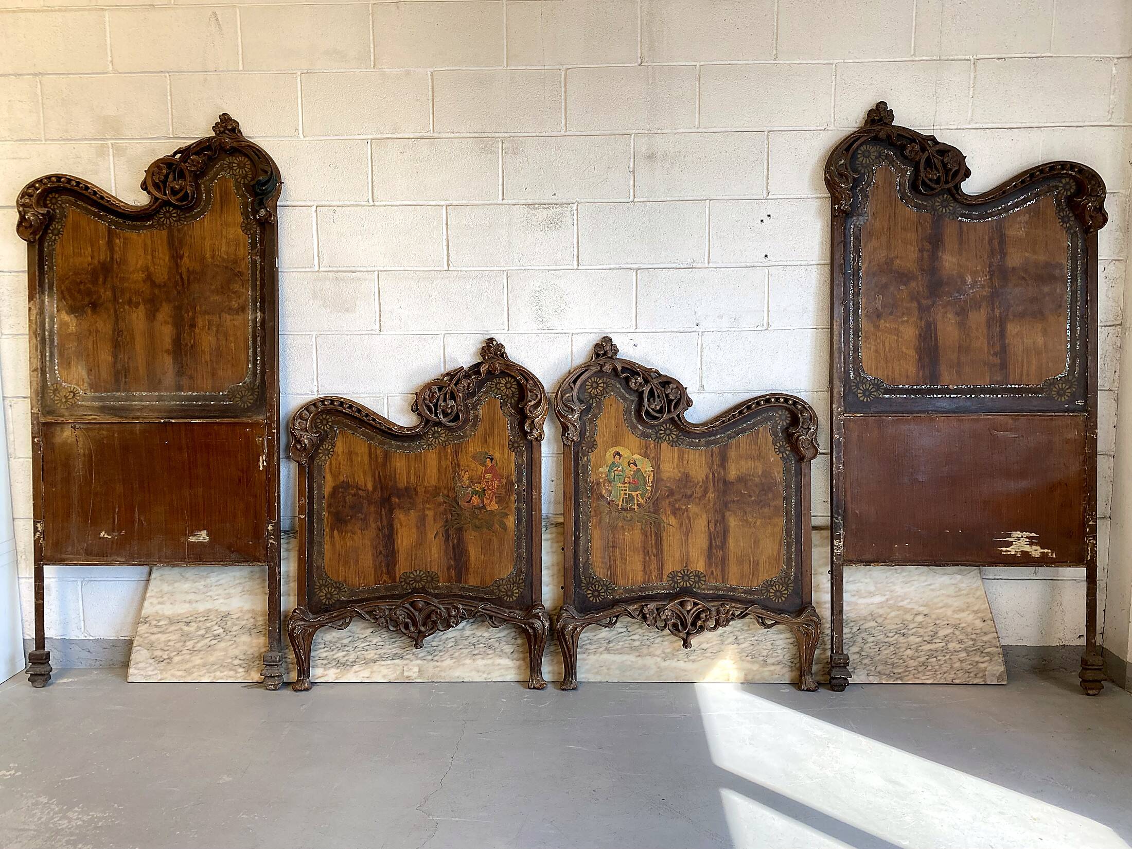 Pair of Art Nouveau cast iron headboards, Italy circa 1900