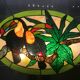 Art Deco style stained glass window representing a couple of toucans