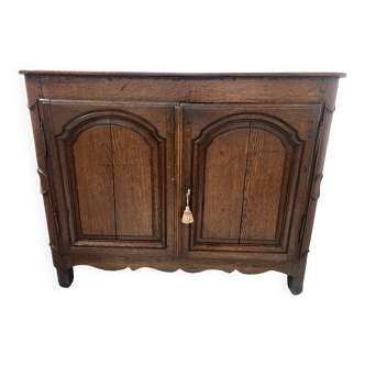 Two-door buffet in solid oak, Louis XIV style, 18th century.
