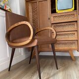 Mid-Century Scandinavian vintage retro armchair with oval armrests.