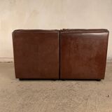 A pair of leather armchairs, Switzerland, 1970s