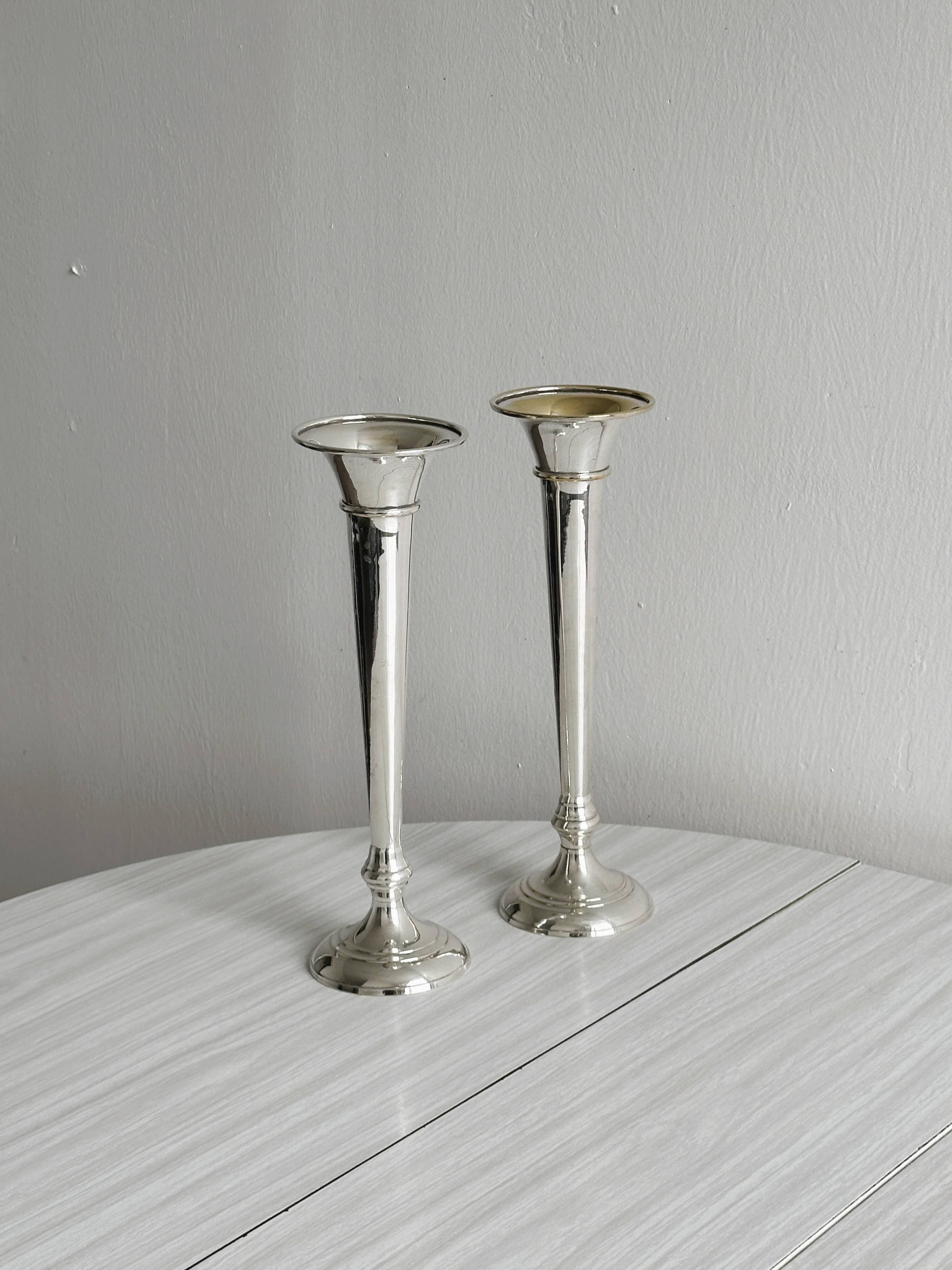 2 large patinated metal soliflores
