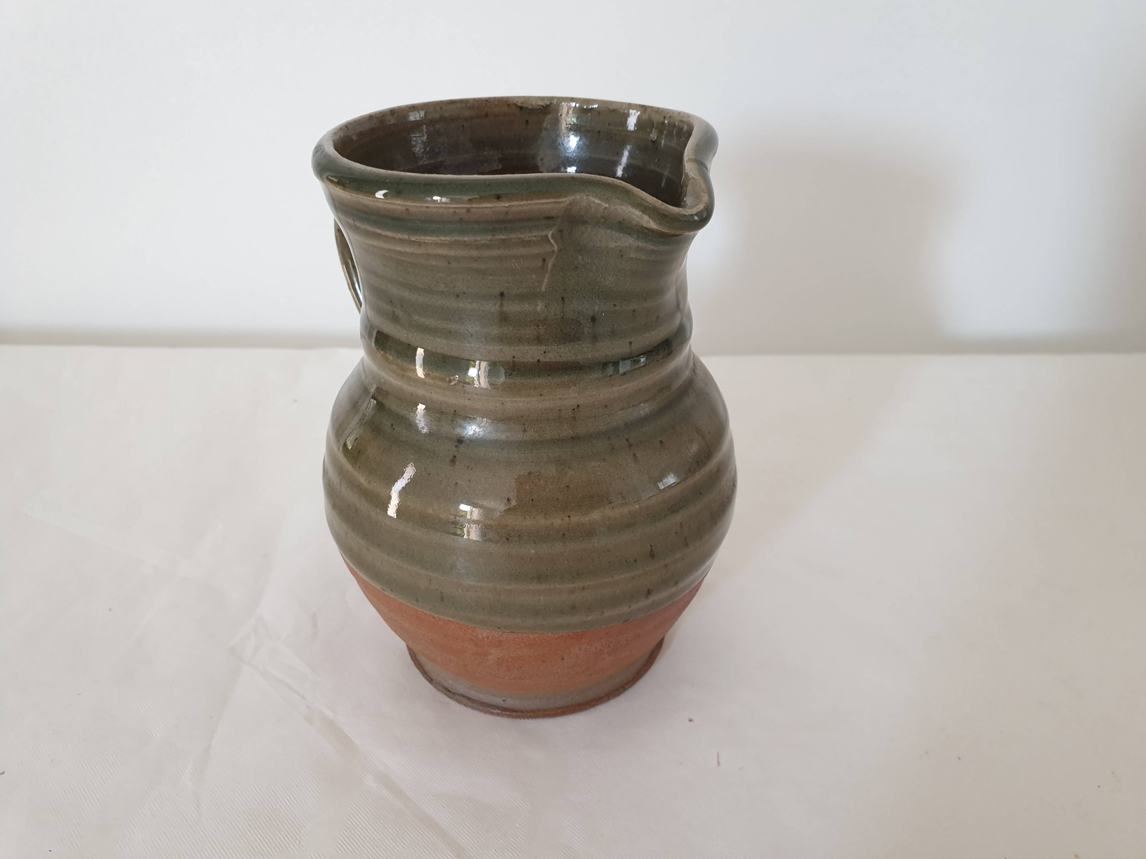 Small pitcher in glazed ceramic signed JC Seguin Puisaye (pictogram)