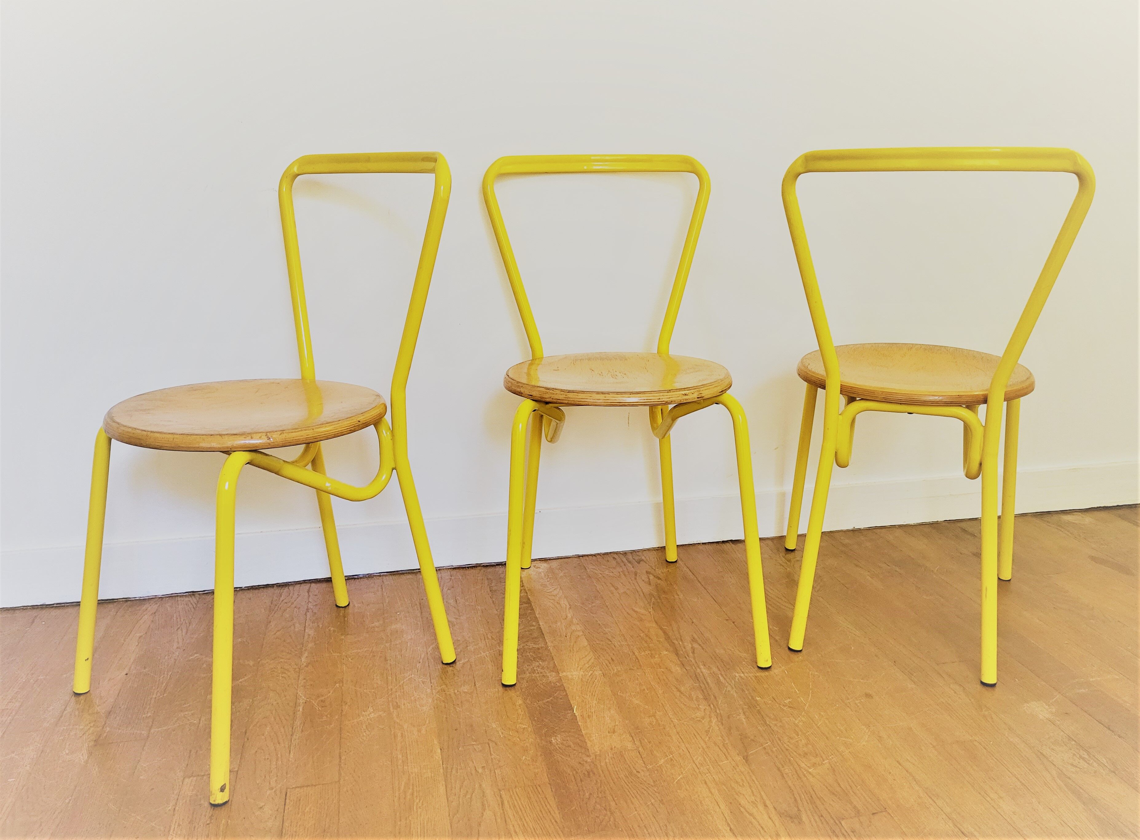Vintage yellow school chairs from the 90s