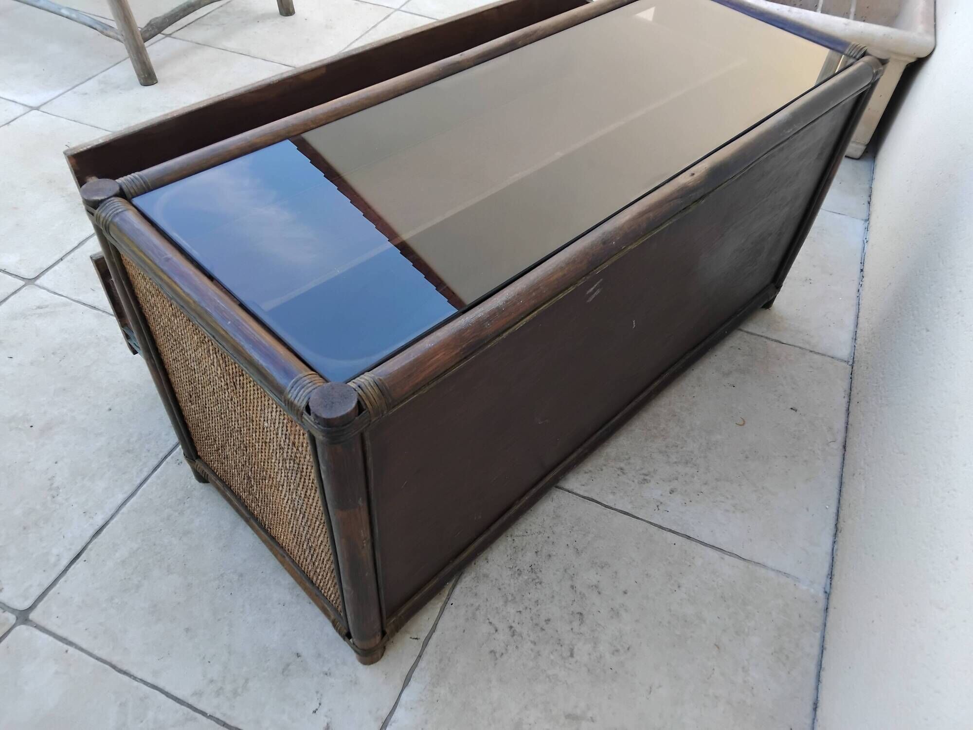 Vintage rattan and glass TV unit.