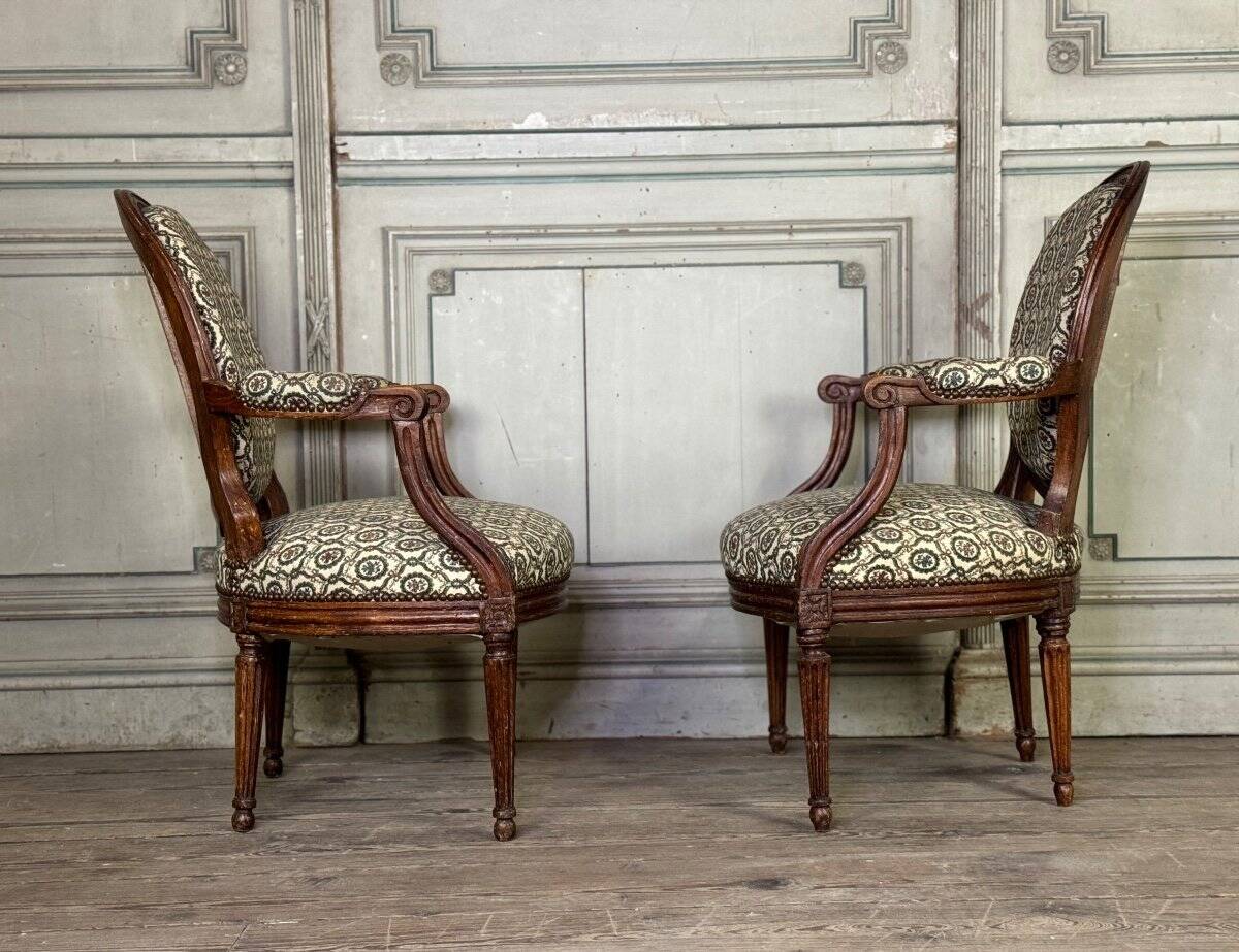 Pair Of Louis XVI Armchairs In Carved Wood, 18th Century