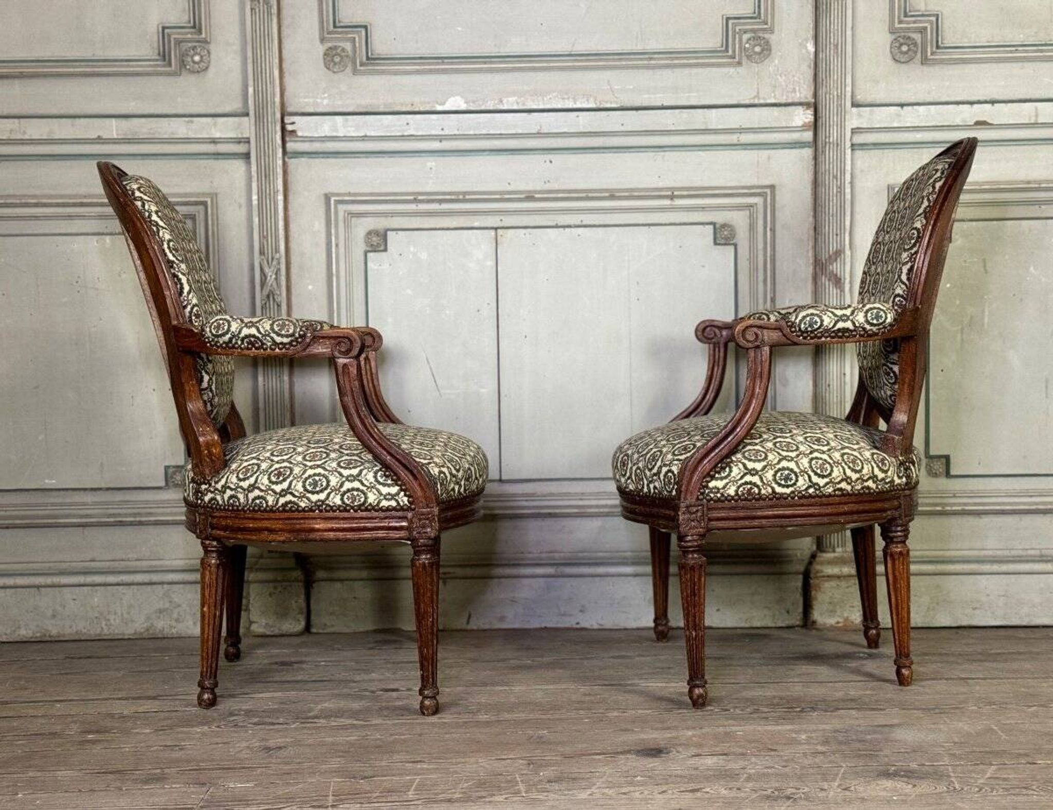Pair Of Louis XVI Armchairs In Carved Wood, 18th Century