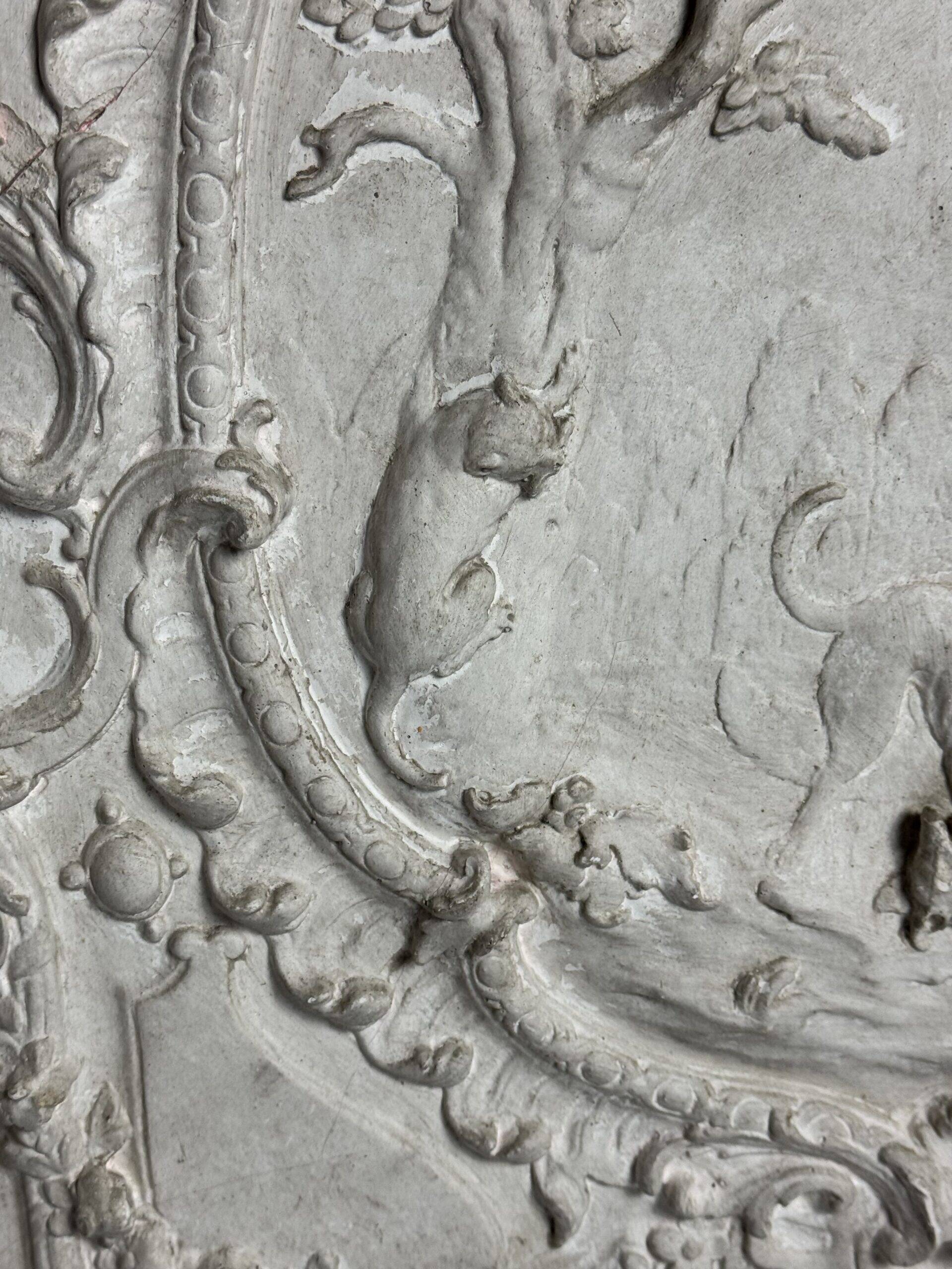 Plaster ceiling fragment framed