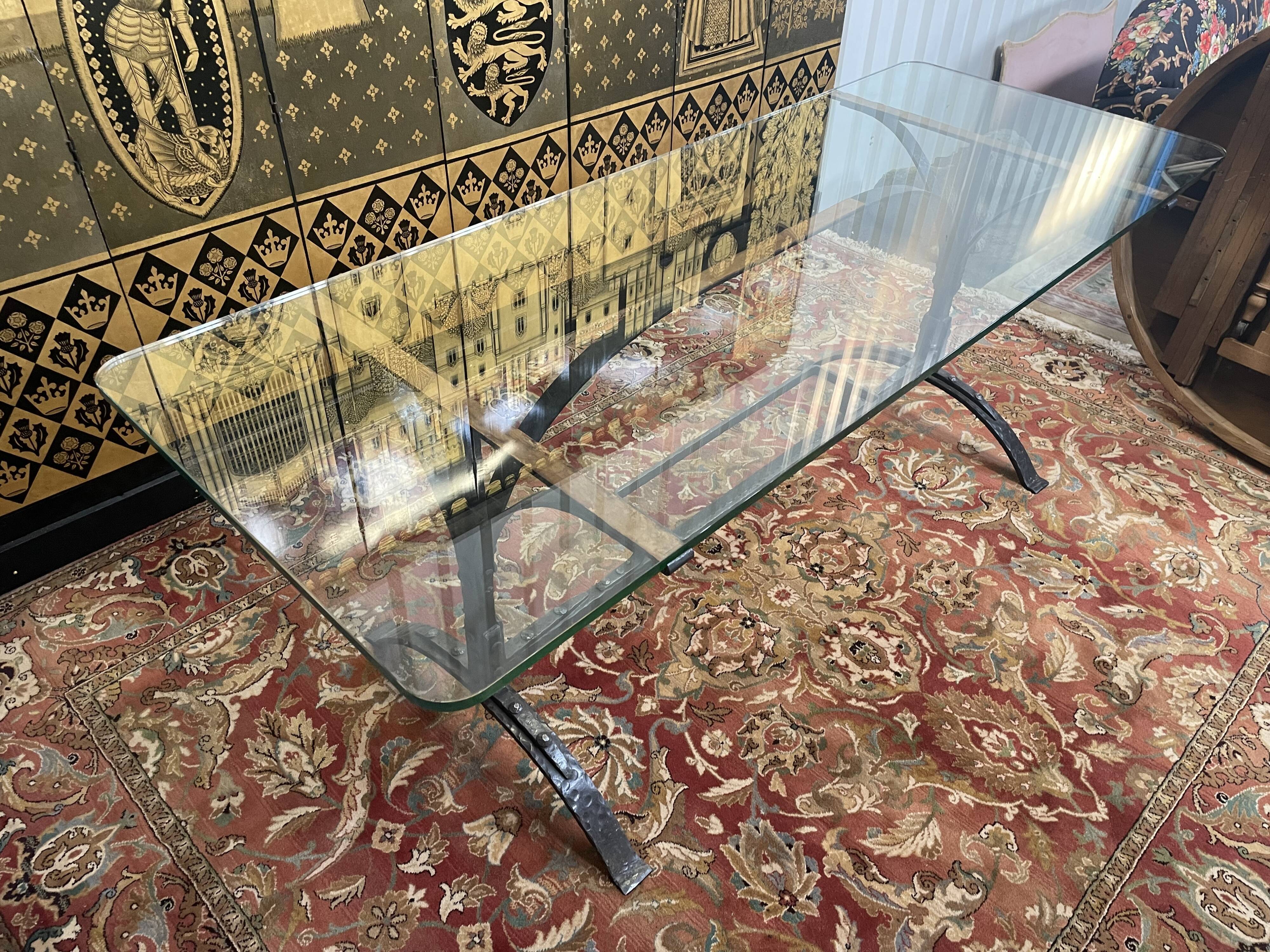 Dining table in wrought iron and glass