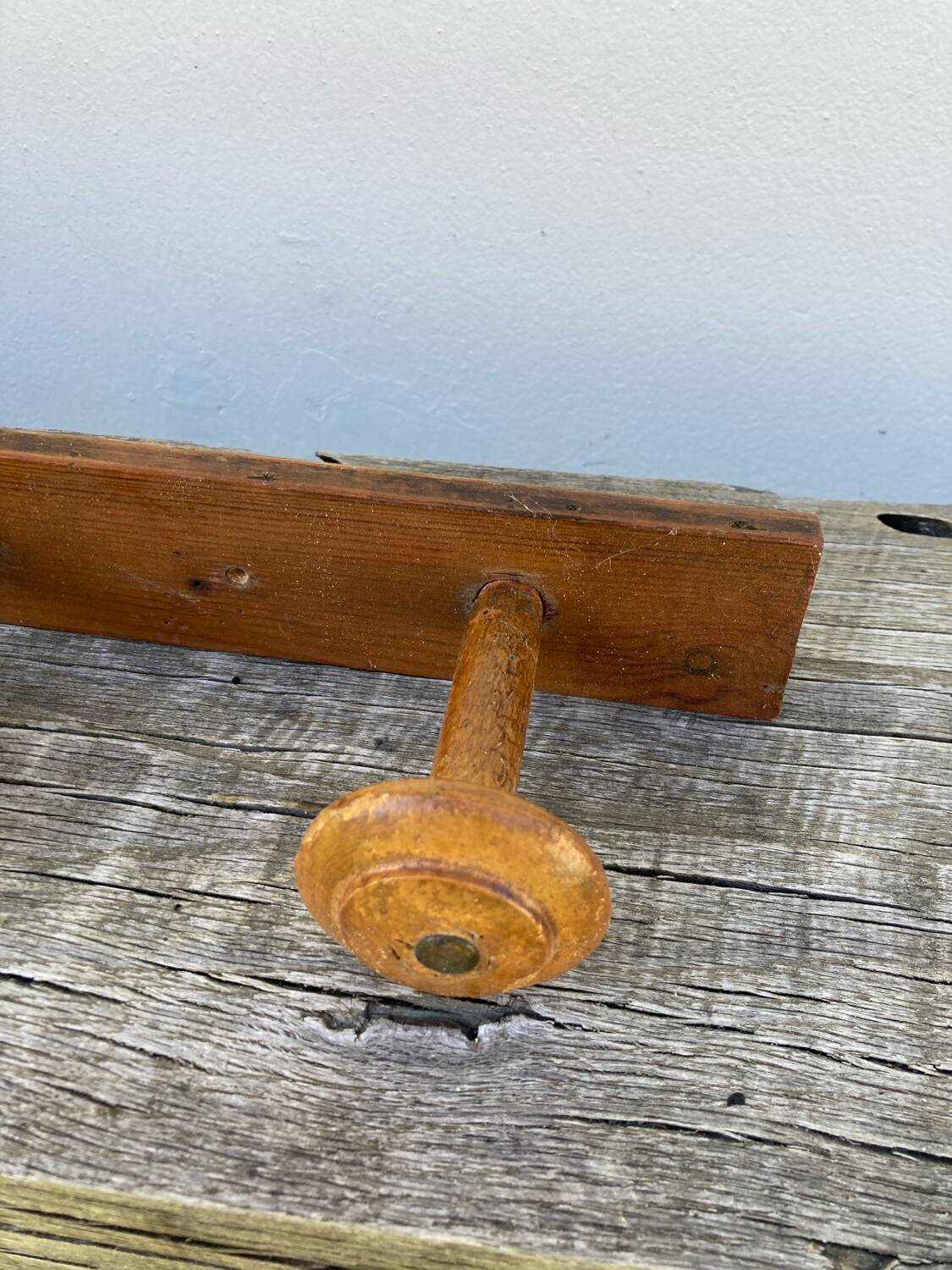 Old wooden wall coat rack