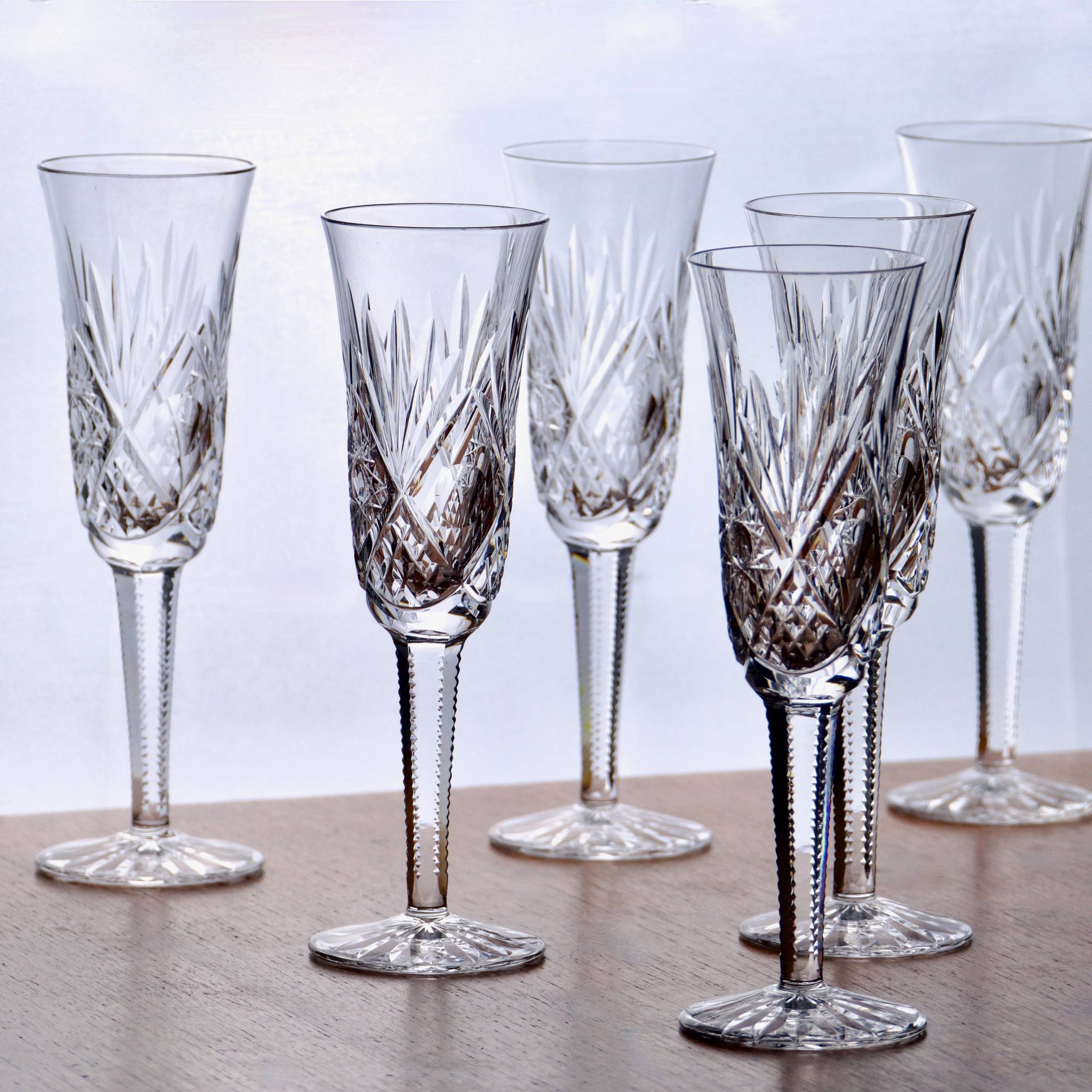 Large antique hand-cut crystal champagne flutes signed LS